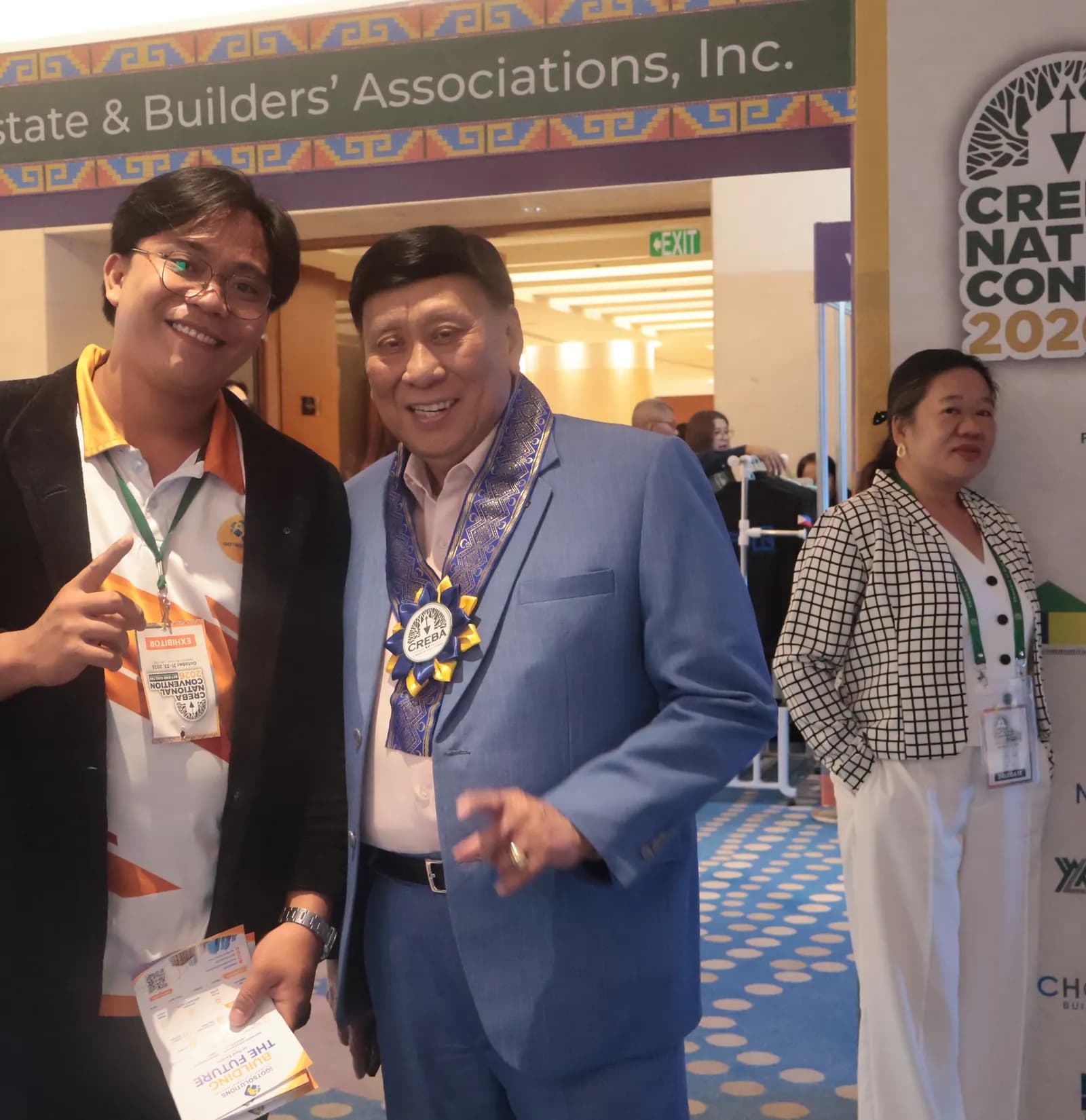 iGotSolutions team member with a CREBA official at CREBA National Convention 2026, Cebu