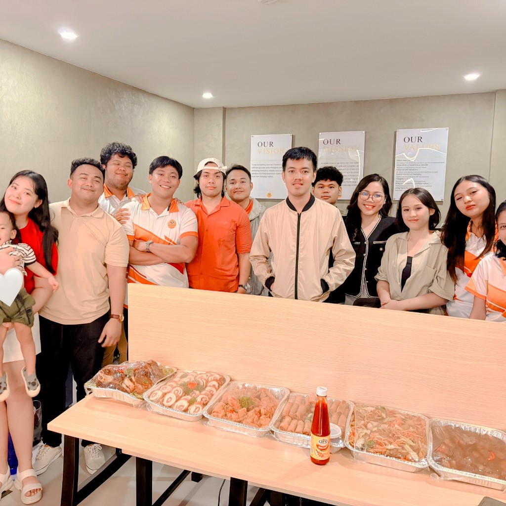 iGotSolutions team celebration with food at the soft opening